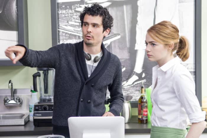 Director_Damien_Chazelle_and_Emma_Stone_on_the_set_of_La_La_Land-700x466.jpg