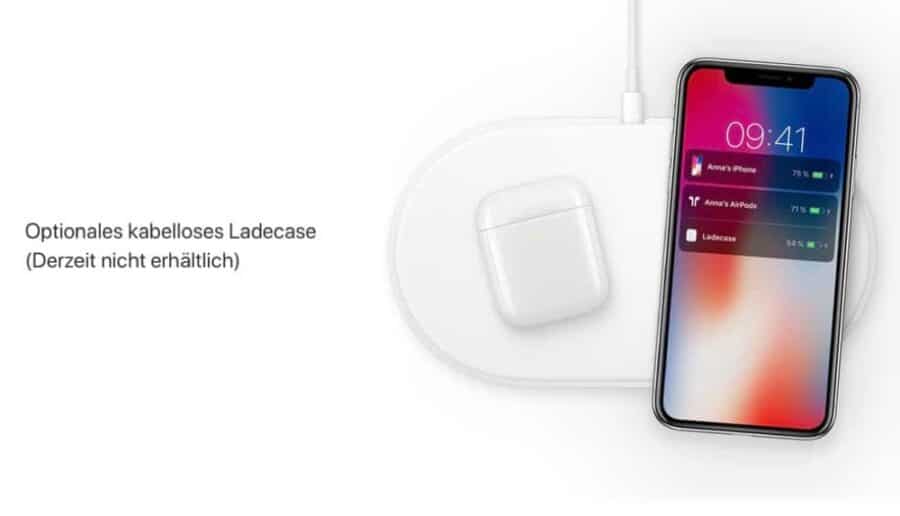 Ein weißes kabelloses Ladecase auf einer AirPower-Ladestation neben einem Smartphone, das den Ladestatus anzeigt.